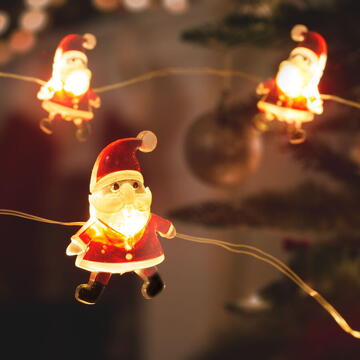 Șir de lumini LED - formă de Moș Crăciun  - 2,2 metri - 20 LEDuri - alb cald - 2 x AA